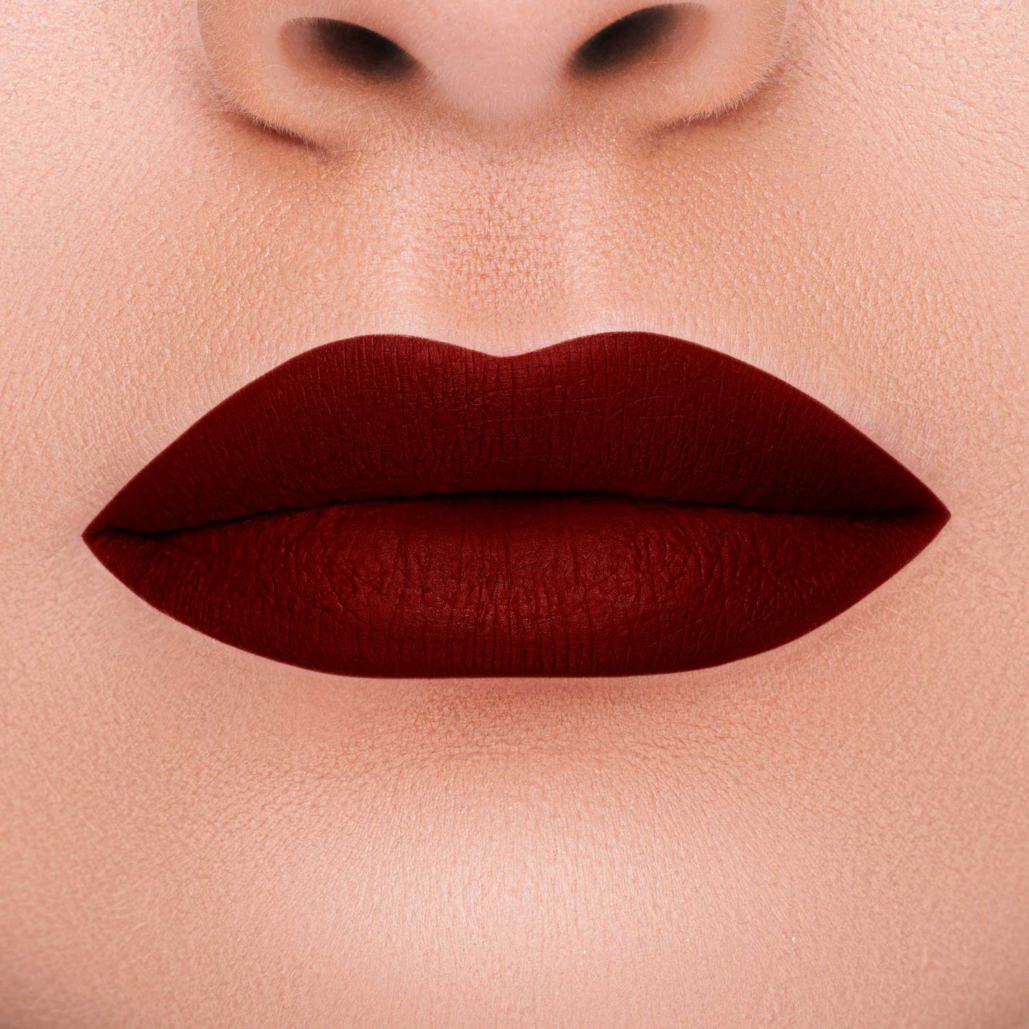 LIQUID MATT LIP DROP SK-310 BURGUNDY: Transfer-proof, pigmented, velvet finish